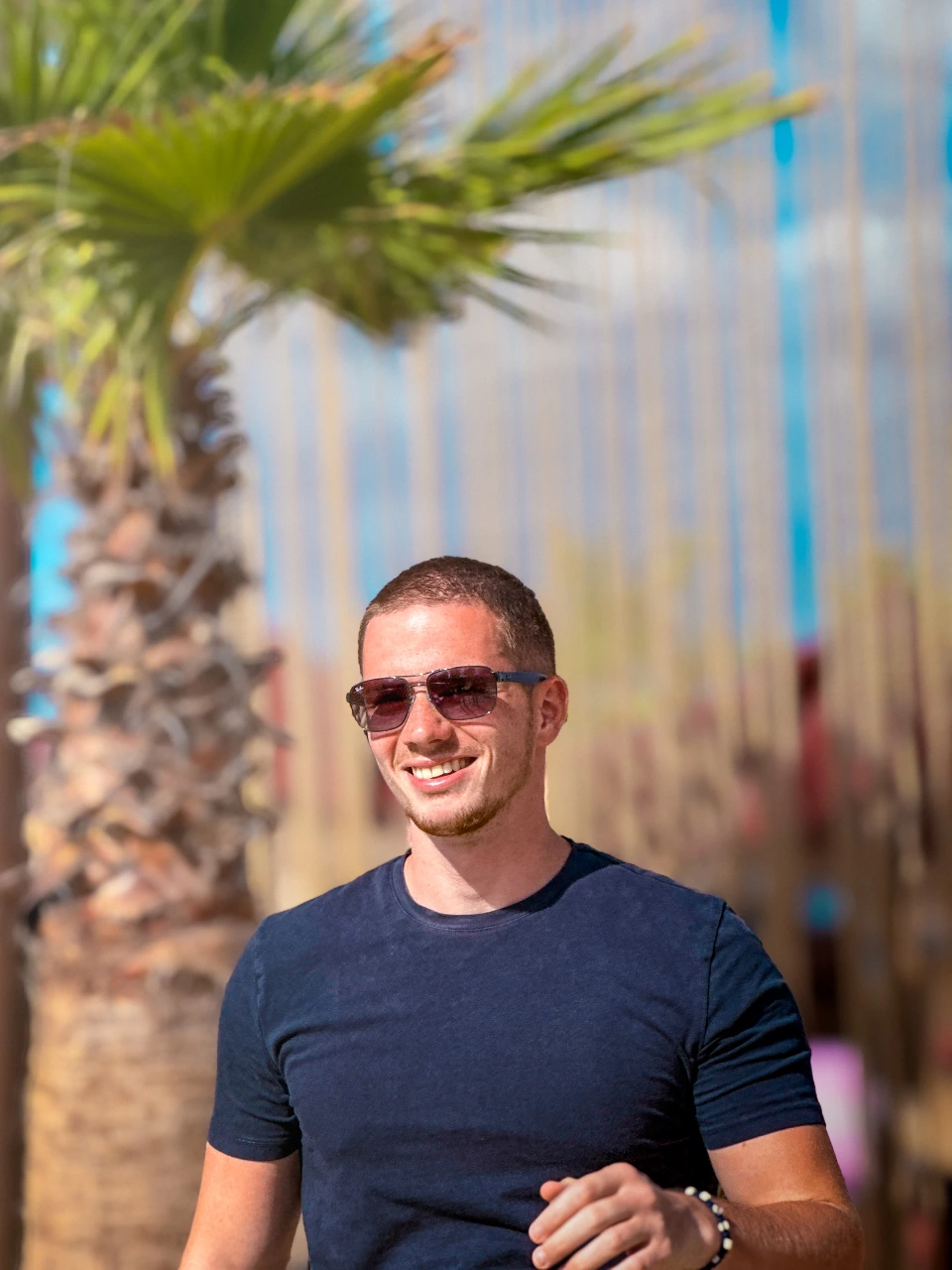 Zarko laughing at the beach.